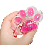 GNIOTEK ANTYSTRESOWY KOCIA ŁAPKA Z OŚCIĄ RYBY SQUISHY 